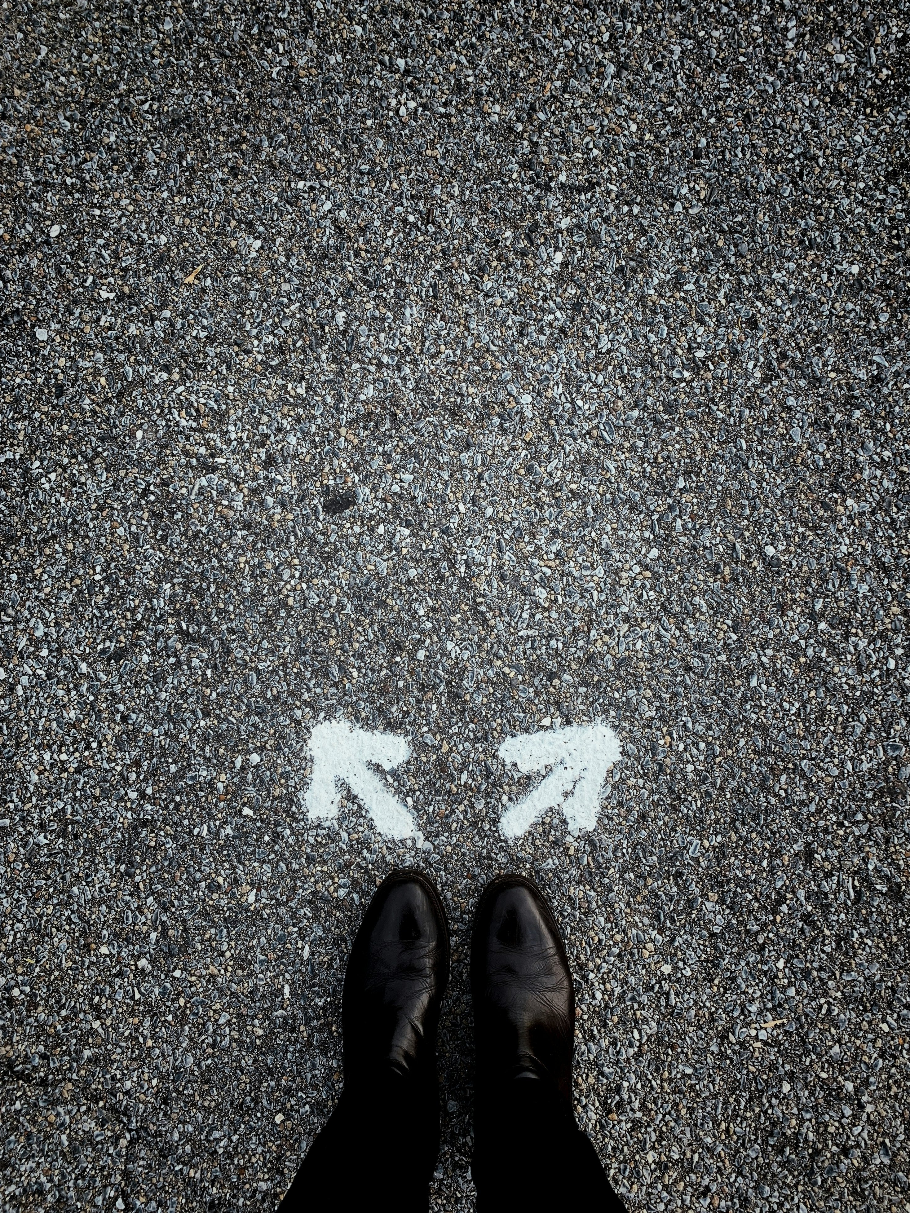 feet with two arrows