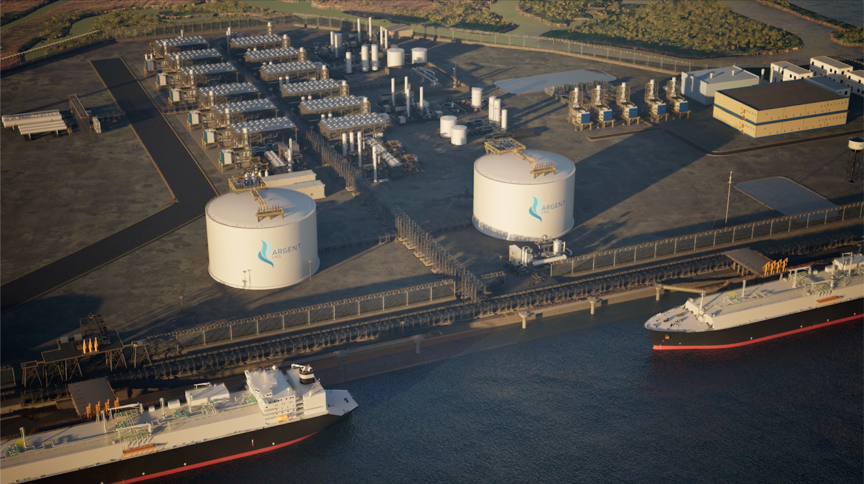 Aerial view of Argent LNG industrial facility with large storage tanks and ships in the vicinity.